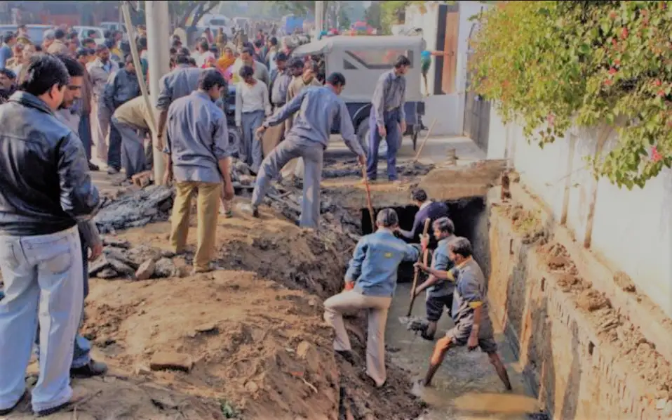 Police team digging bodies
